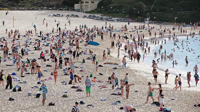 People at Coogee Beach, where people were allowed to exercise between 6am and 9am. Picture: Adam Yip