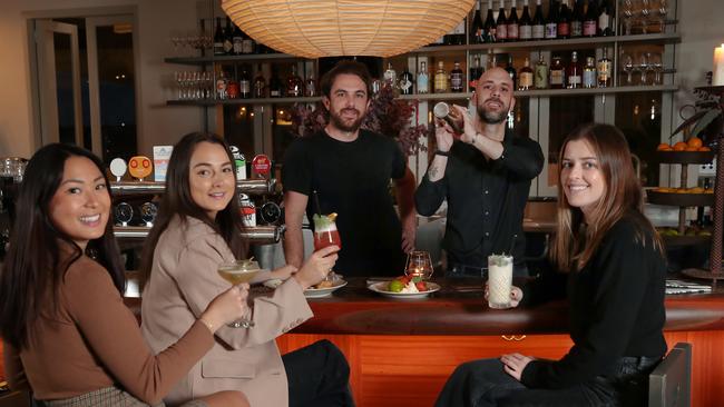 Cityfields will be the first venue to open a rooftop bar at Chadstone Shopping Centre next Friday. Nathalia Haysom, Georgia Bell and Sarah Brash with co-owner Adam Wright-Smith. Picture: David Crosling