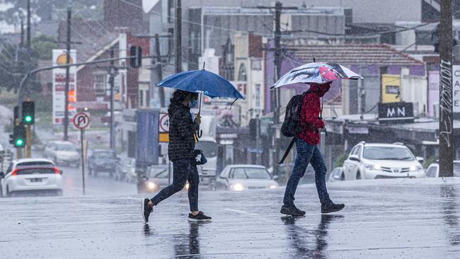 Showers in Melbourne are expected to ease over the morning. Picture by Wayne Taylor.