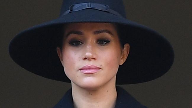 (FILES)  Britain's Meghan, Duchess of Sussex looks on from a balcony as she attends the Remembrance Sunday ceremony at the Cenotaph on Whitehall in central London, on November 10, 2019. - Remembrance Sunday is an annual commemoration held on the closest Sunday to Armistice Day, November 11, the anniversary of the end of the First World War and services across Commonwealth countries remember servicemen and women who have fallen in the line of duty since WWI. (Photo by Daniel LEAL-OLIVAS / AFP)