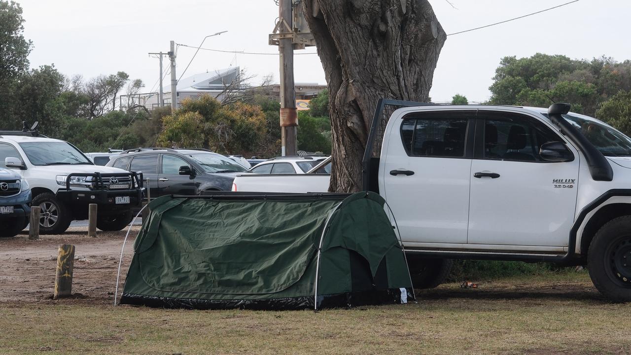 Illegal campers at Torquay are not even trying to hide, setting up in plain sight despite large warning signs.