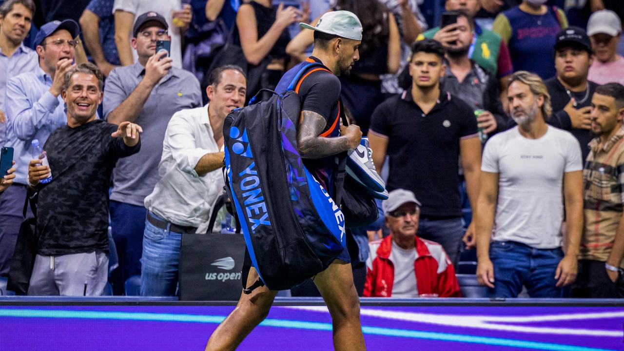 Australia's Nick Kyrgios walks off the court after losing his 2022 US Open Tennis tournament men's singles quarter-final match against Russia's Karen Khachanov at the USTA Billie Jean King National Tennis Center in New York on September 6, 2022. (Photo by COREY SIPKIN / AFP)