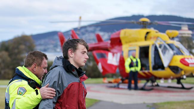 Stephen Ward leaves the Westpac Rescue Helicopter. Stephen and his Dad, John, were missing for three nights in Tasmania’s South-West wilderness before being rescued. Picture: Richard Jupe