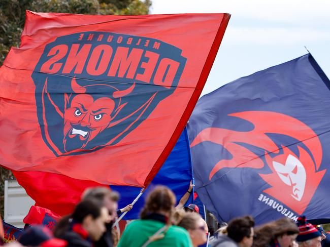 MELBOURNE, AUSTRALIA - OCTOBER 28: Demons flags are seen during the 2023 AFLW Round 09 match between The Melbourne Demons and The Fremantle Dockers at Casey Fields on October 28, 2023 in Melbourne, Australia. (Photo by Dylan Burns/AFL Photos via Getty Images)