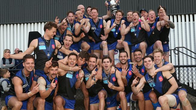 Uni Blues celebrate with the trophy after VAFA (Premier) Grand  Final: University Blues v St Kevin's on Sunday, September 22, 2019, in Elsternwick, Victoria, Australia. Picture: Hamish Blair