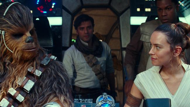 Joonas Suotamo as Chewbacca, Oscar Isaac as Poe Dameron, Daisy Ridley as Rey and John Boyega as Finn in Star Wars: The Rise Of Skywalker.