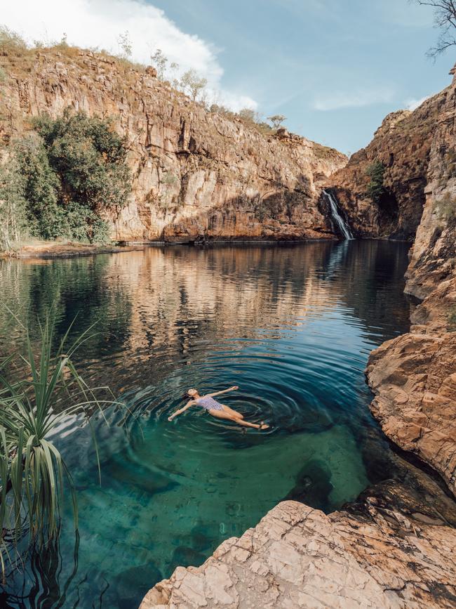 Maguk is a pristine natural waterfall and plunge pool at the base of steep gorge walls.
