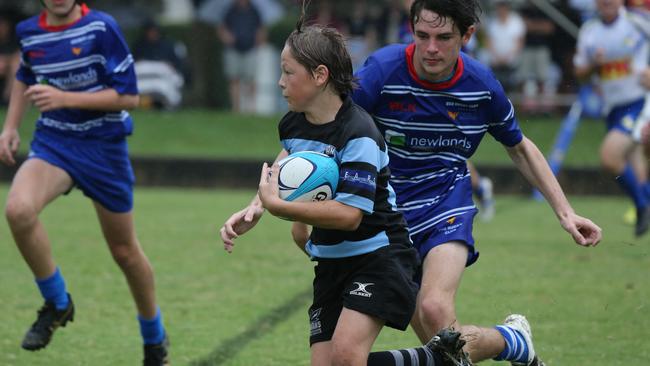 Day 1 of the King of the Country junior rugby union tournament at the Gold Coast Eagles Rugby Union Club.Maroochydore Swans (BLUE AND BLACK) vs USQ Saints (Blue ) Maroochydore Player No USQ Player No Pic Mike Batterham