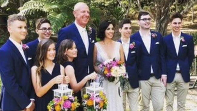 Amaze Education owner Lucy Cook with now husband Peter Schweizer and their 7 children at the Currumbin Wildlife Sanctuary on their wedding day.