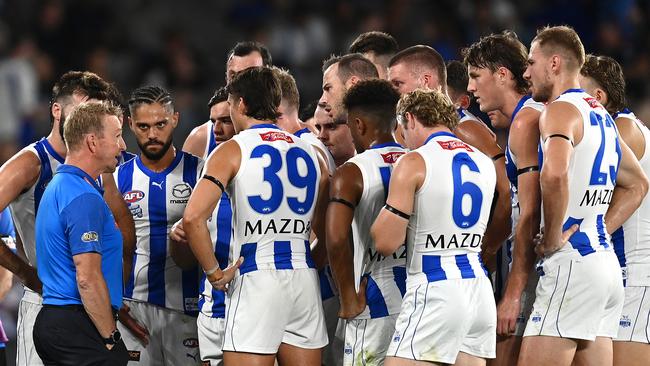 The Roos regrouped at quarter time. Picture: Getty Images