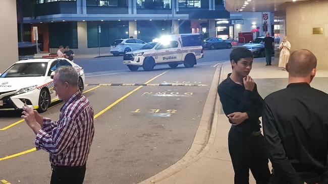 Guests are evacuated from the Darwin CBD hotel after it was evacuated when a guest found a note in her room stating there was a bomb in the building. Picture: SUpplied