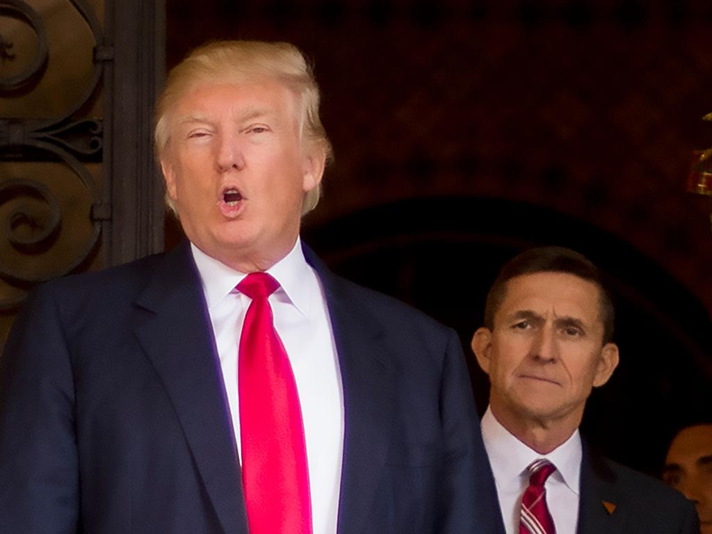 President Donald Trump with Michael Flynn in 2016. Picture: JIM WATSON / AFP.