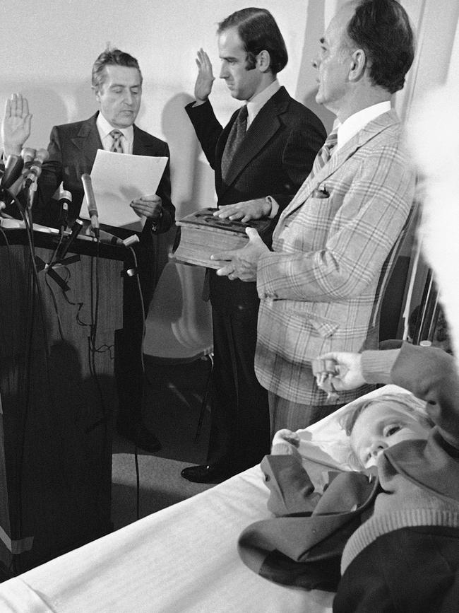 Young Beau Biden plays as his father is sworn in.