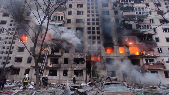 Burnt out cars and a shelled apartment building in Kyiv’s Obolon district. Picture: State Mergency Service of Ukraine/AFP