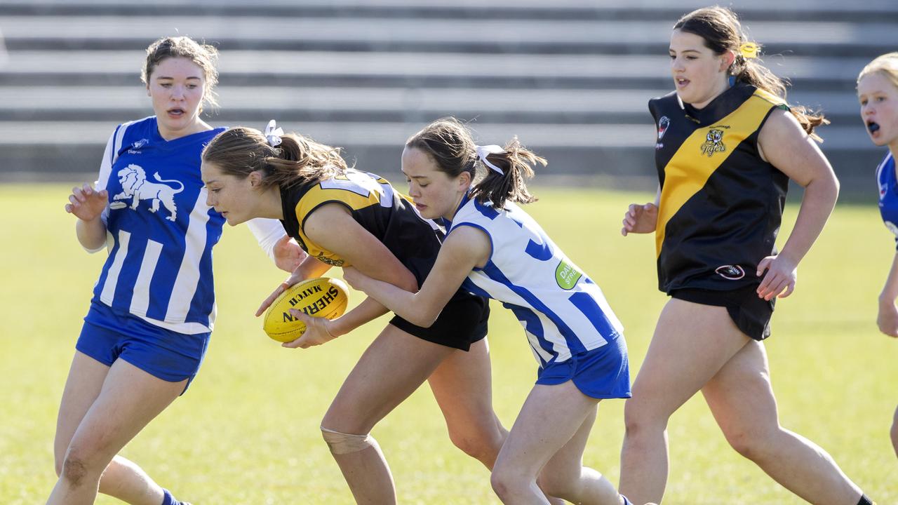 STJFL U14 A2, Kingborough Indy Hunt and Sandy Bay Holly Durovic at North Hobart. Picture: Chris Kidd