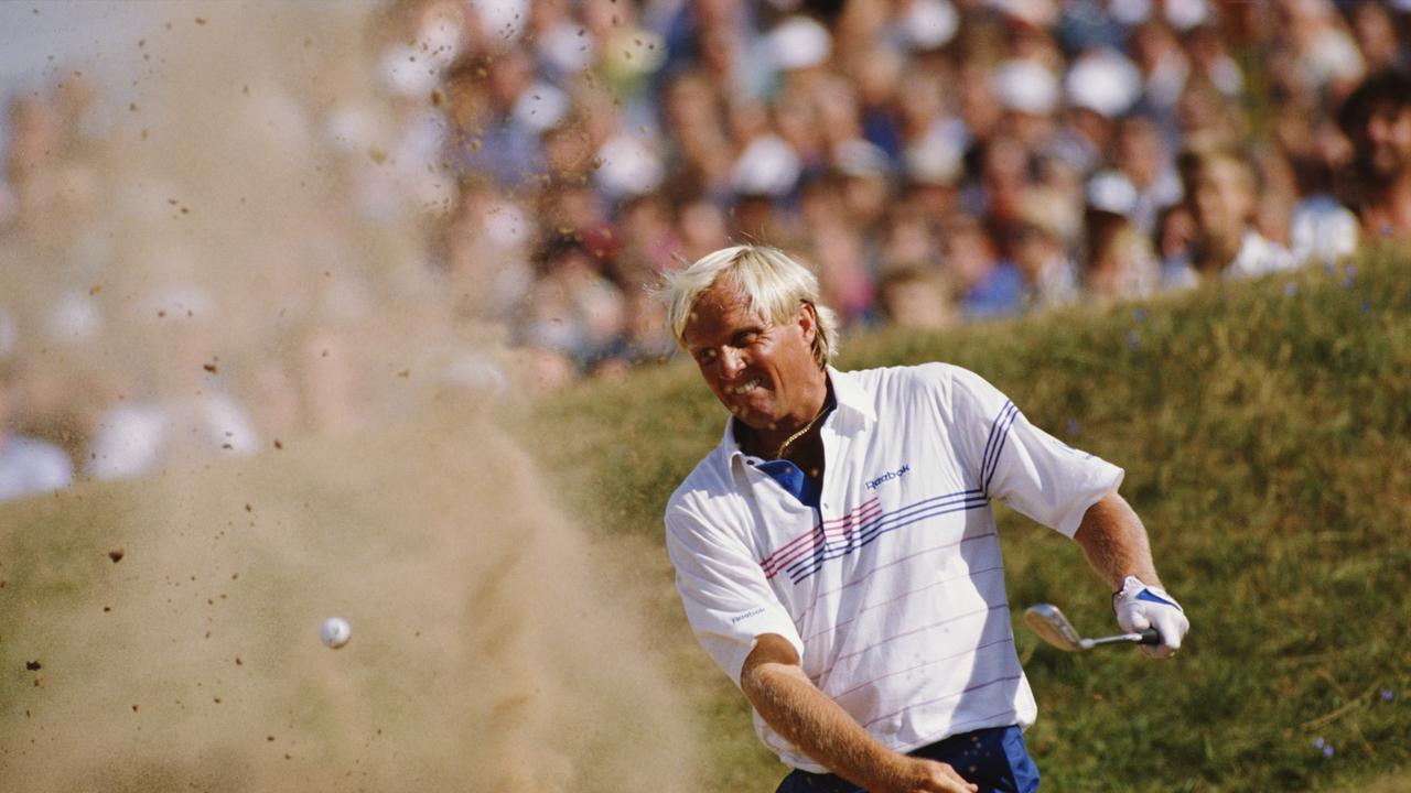 Greg Norman plays a shot from the bunker in the 1989 British Open. Picture: Simon Bruty/Getty Images