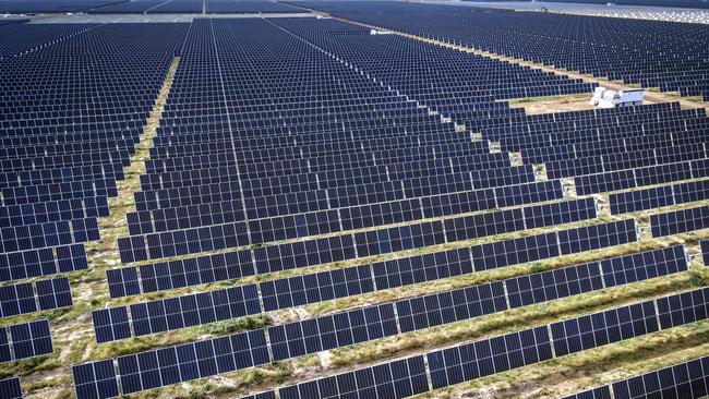 Photovoltaic modules at a solar farm on the outskirts of Gunnedah, New South Wales, Australia, on Friday, April 16, 2021. Most Australians would prefer investment inÃÂ clean energyÃÂ to help lift the economy out of its Covid-induced recession to the governments plan for a "gas-fired" recovery. Photographer: David Gray/Bloomberg via Getty Images