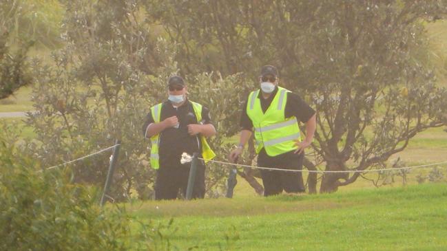 Security is tight with guards all throughout the golf course and police patrolling a seclusion zone off the coast. Picture: John Grainger