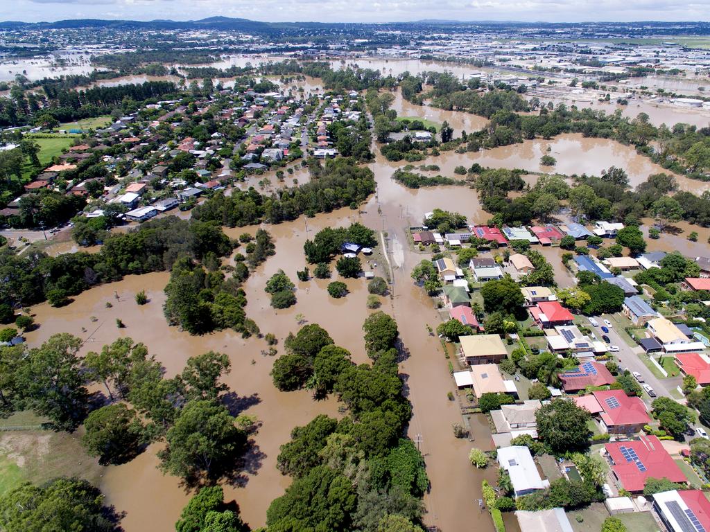 In the foreground the suburbs of Corinda and Oxley with other locations on the south and southwestern suburbs of Brisbane are seen flooded on March 01, 2022. (Photo by Bradley Kanaris/Getty Images)