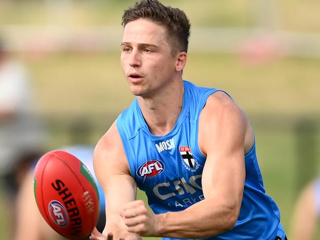 MELBOURNE, AUSTRALIA - FEBRUARY 17: Jack Billings of the Saints handballs during a St Kilda Saints AFL training session at RSEA Park on February 17, 2023 in Melbourne, Australia. (Photo by Quinn Rooney/Getty Images)