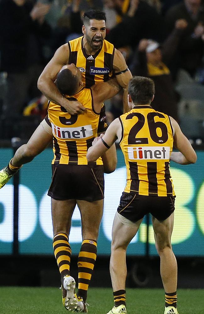 Paul Puopolo, Shaun Burgoyne and Liam Shiels celebrate the matchwinning goal. Picture: George Salpigtidis