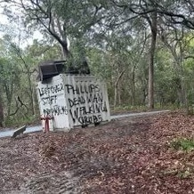 The message spray painted onto a shipping container at Couran Cove. Picture: supplied