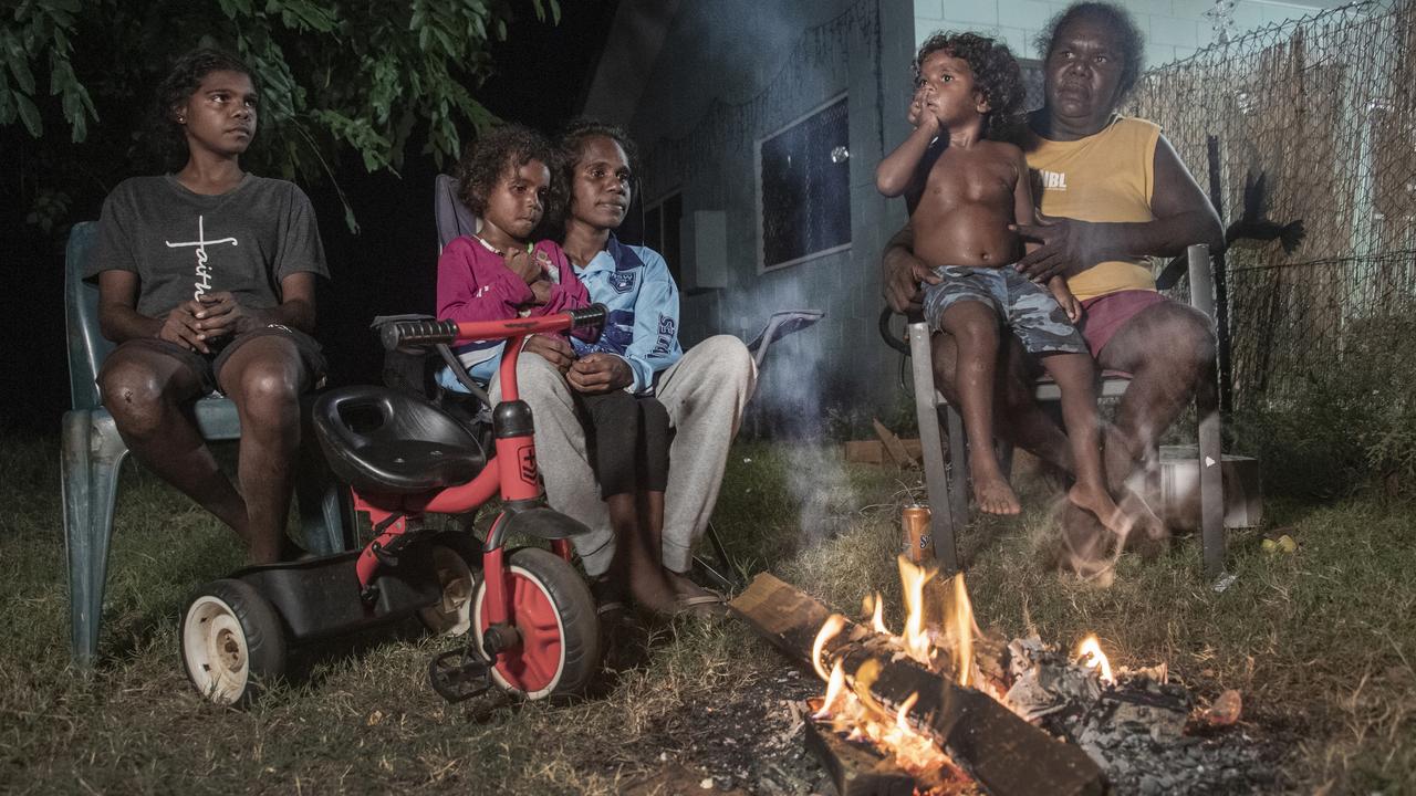 The Loogatha family, of Mornington Island, yarn around the fire. Picture: Brian Cassey