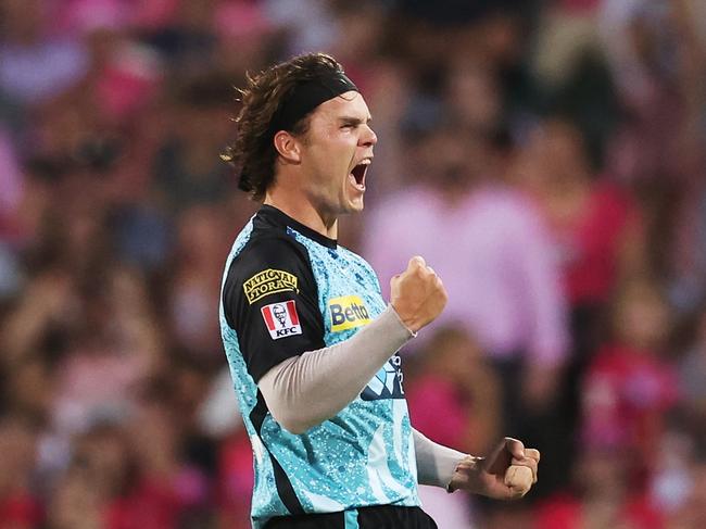 SYDNEY, AUSTRALIA - JANUARY 24:  Mitch Swepson of the Heat celebrates taking the wicket of Jordan Silk of the Sixers during the BBL Final match between Sydney Sixers and Brisbane Heat at Sydney Cricket Ground, on January 24, 2024, in Sydney, Australia. (Photo by Matt King/Getty Images)