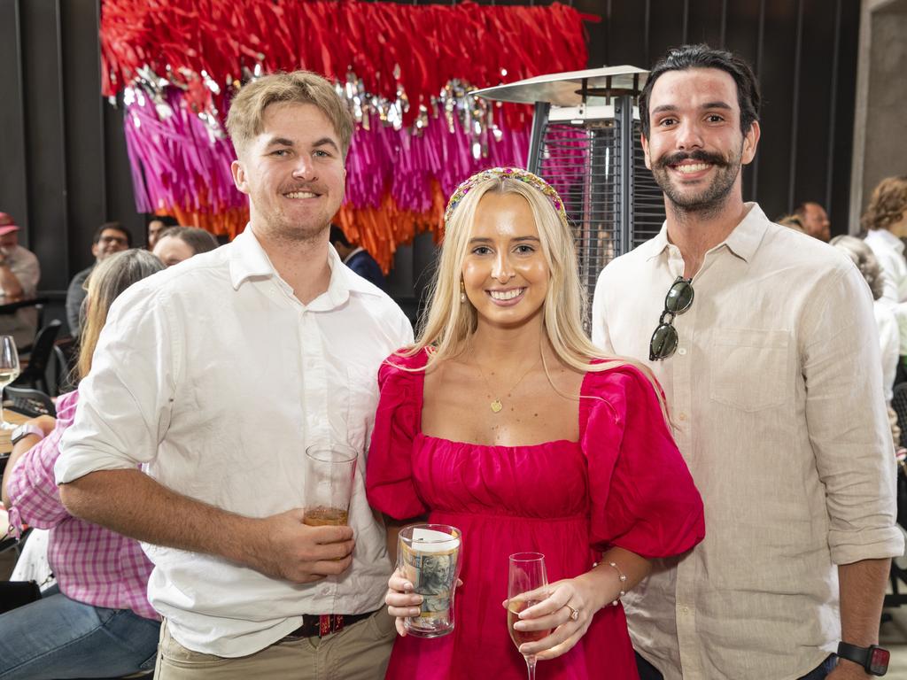 At the Melbourne Cup party are (from left) Riley Wockner, Holly Walker and Callum Hart at The Rock, Tuesday, November 1, 2022. Picture: Kevin Farmer