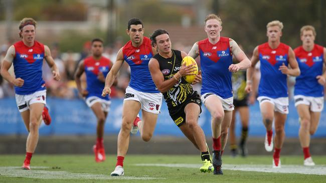 Daniel Rioli leaves the Demons in his wake in a pre-season game in Shepparton. Picture: Michael Klein