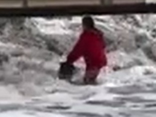 Woman and dog smashed by wave.