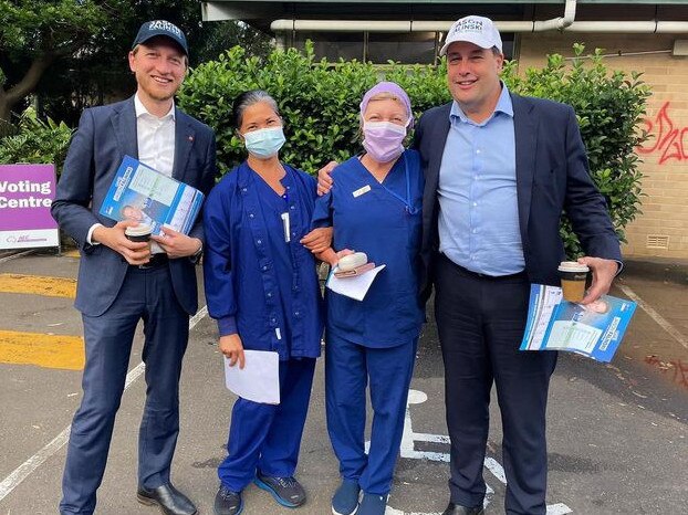 Liberal MP for Mackellar Jason Falinski (right) with LIberal Senator James Paterson (left ) with two voters at the Warriewood pre-poll centre on Tuesday. Picture: Facebook (Jason Falinski)