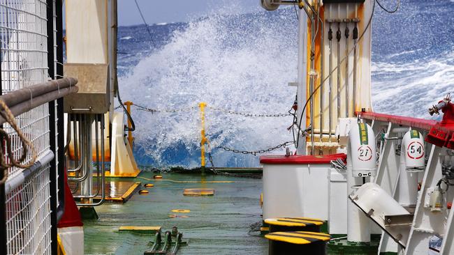 Waves crash over the back deck of Fugro discover as she continues in the search for the missing Malaysia Airlines flight MH370. *** Local Caption *** Fugro Discover continues the seabed search for the missing Malaysia Airlines flight MH370 in the Southern Indian Ocean.