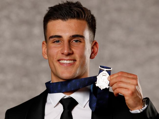 Nick Daicos beams with his silverware. Picture: AFL Photos/Getty Images