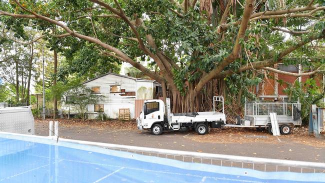 The Sunshine Coast Council has put a barricade up in a Duporth Av car park ahead of the planned removal of an asbestos-ridden building and an old fig tree to make way for more car parks. Picture: Patrick Woods.