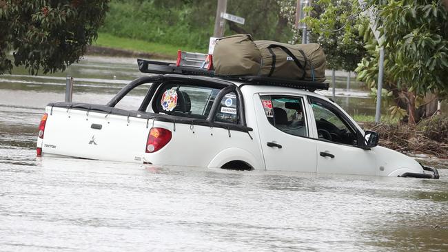 A car surrounded by flood water on the Esplanade in Maribyrnong in Victoria. Picture: NCA NewsWire / David Crosling