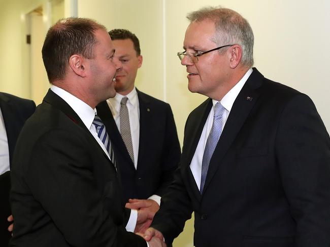 Josh Frydenberg and Scott Morrison after winning the vote in the Liberal Leadership spill at Parliament House in Canberra. Picture: Kym Smith