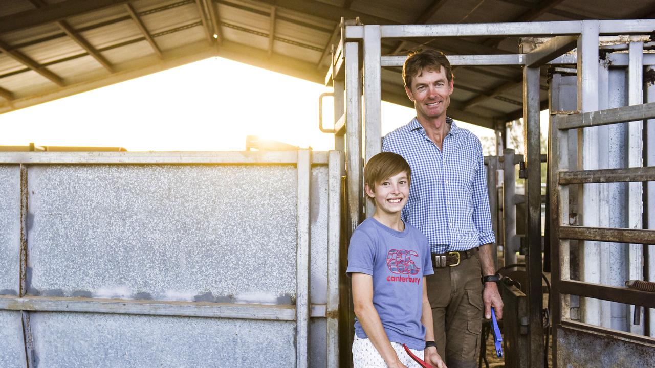 Harry and Nick in the cattle yards. Picture: Dannika Bonser