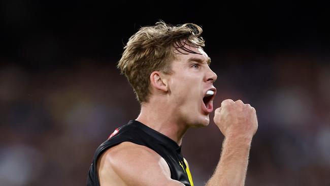 MELBOURNE, AUSTRALIA - MARCH 14: Tom Lynch of the Tigers celebrates a goal during the 2024 AFL Round 01 match between the Carlton Blues and the Richmond Tigers at the Melbourne Cricket Ground on March 14, 2024 in Melbourne, Australia. (Photo by Michael Willson/AFL Photos via Getty Images)