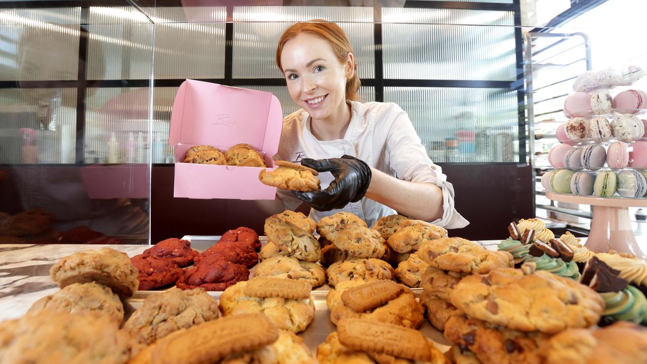 Brooke Saward at Brooki Bakehouse in Fortitude Valley with her best-selling NYC cookies and Lotus Biscoff cookies. Picture: Steve Pohlner