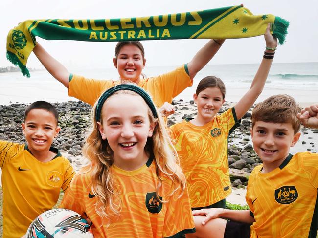 The Socceroos will be announcing a World Cup qualifier will be held on the Gold Coast later this week. Ready to cheer them on will be local juniors from  left: Duke Ablang, Elena Bresic, Roukaya Al-Kahil,  Valentina Ablang, Onika Mackintosh, Junaid Al-Kahil. Picture Glenn Hampson
