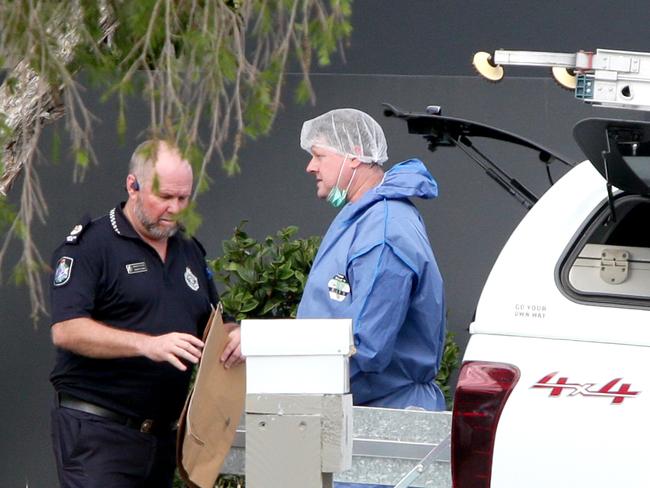 Investigators at the scene on Ronald St, Wynnum. Picture: Steve Pohlner