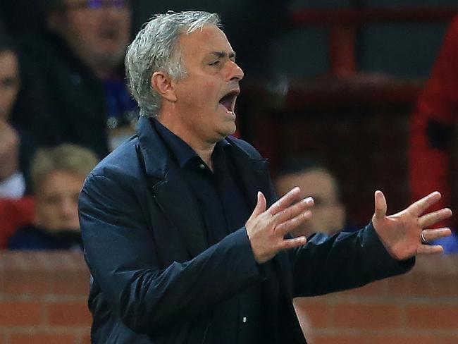 Manchester United's Portuguese manager Jose Mourinho shouts instructions to his players from the touchline during the Champions League group H football match between Manchester United and Valencia at Old Trafford in Manchester, north west England, on October 2, 2018. (Photo by Lindsey PARNABY / AFP)