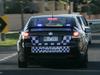 Driver flees after allegedly ramming police car