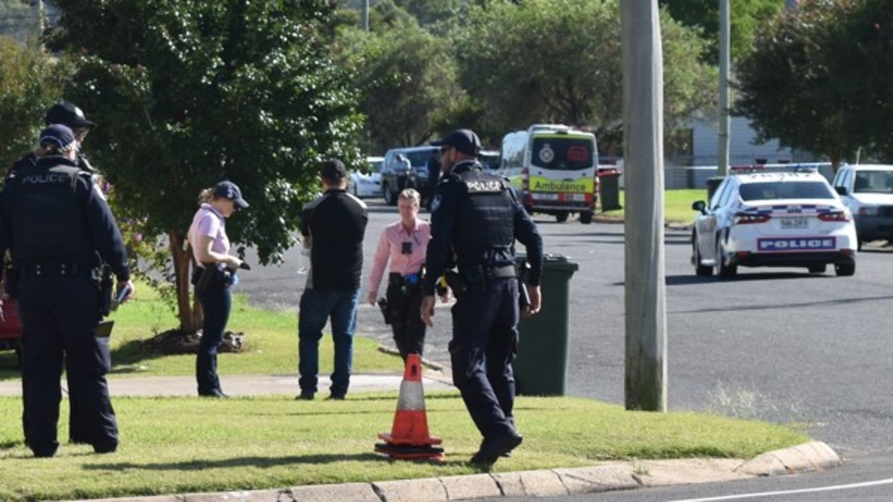 Officers at the corner of Wantley and Wood Street just before 9am Tuesday. Photo: Michael Hudson.