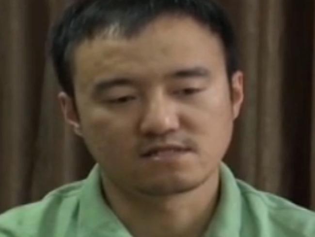 This screen grab taken from a CCTV footage shows Wang Xiaolu, a financial journalist with the respected business magazine Caijing, confessing on China's main state broadcaster on August 31, 2015. China's main state broadcaster on August 31 paraded Wang Xiaolu "confessing" to causing the stock market "great losses" as authorities seek to rein in a rout on the exchanges. AFP PHOTO / CCTV ----EDITORS NOTE---- RESTRICTED TO EDITORIAL USE - MANDATORY CREDIT "AFP PHOTO / CCTV" - NO MARKETING NO ADVERTISING CAMPAIGNS - DISTRIBUTED AS A SERVICE TO CLIENTS