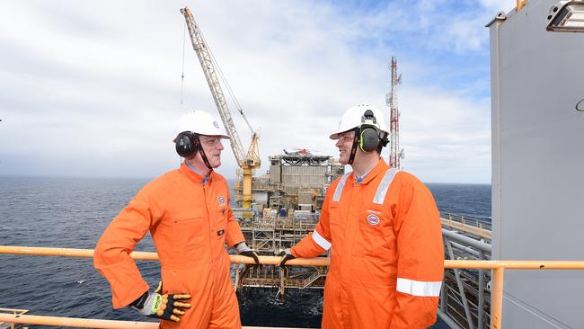 APPEA chief executive Andrew McConville with Exxon chairman Nathan Fay Barracouta gas field rig in Bass Strait. Picture: Sharon Walker