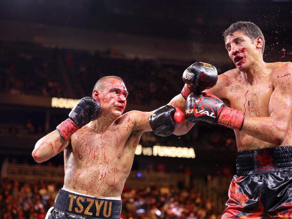 Tszyu (L) connects with a punch on Fundora late in the fight. Picture: Getty