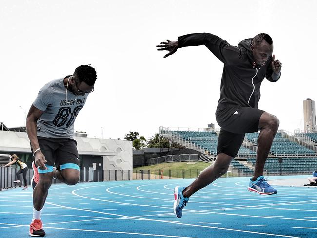Bolt gets back to his main trade, training at Albert Park Athletics track.