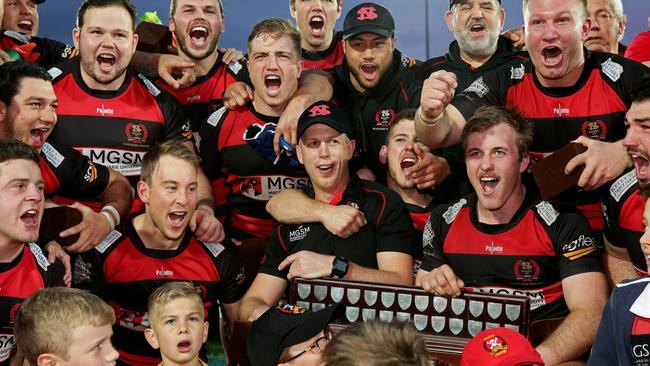 Northern Suburbs coach (middle) Simon Cron, his team &amp; supporters celebrate winning the Shute Shield against Sydney University at North Sydney Oval. Northern Suburbs broke a 41-year premiership drought, taking out the game 28-15. Picture: Troy Snook